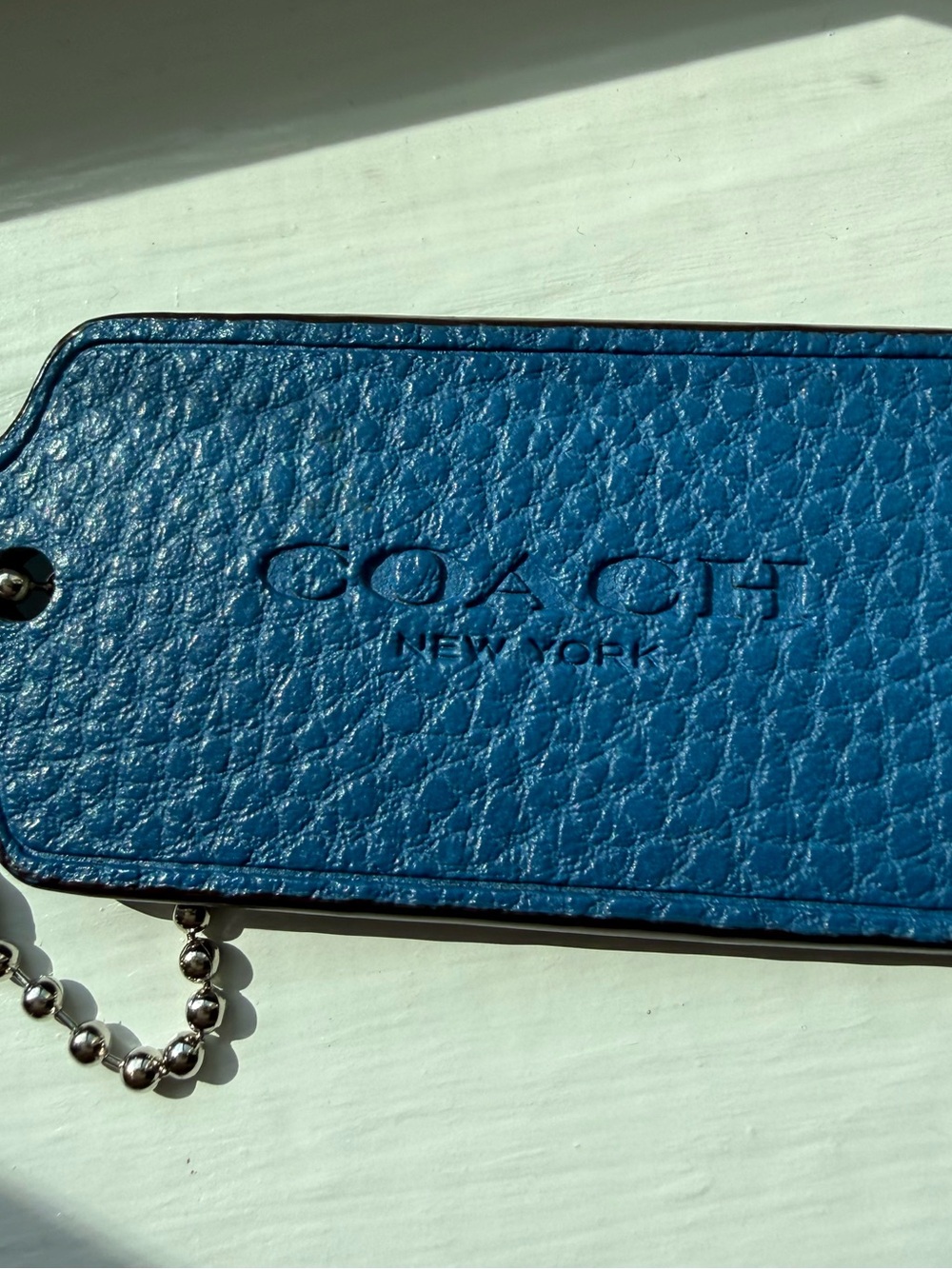 Coach Blue Pebbled Leather bag Tag